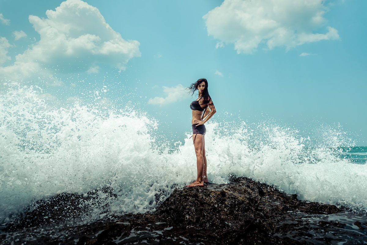 Model on Costa Rica rocks by Raquel Mililan