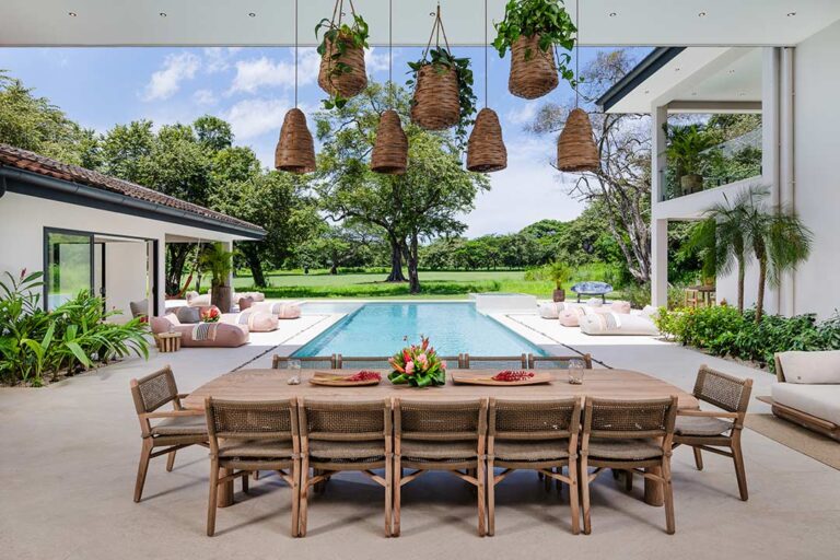 Airbnb photography Costa Rica – tropical dining area with poolside view