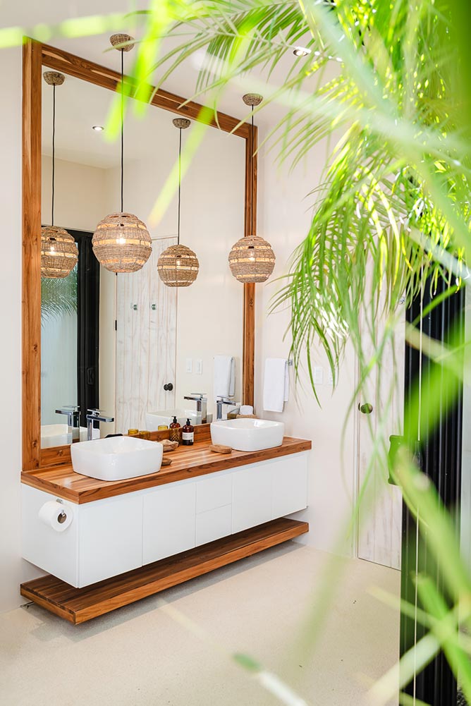 Airbnb photography Costa Rica – modern bathroom with double vanity and warm tones