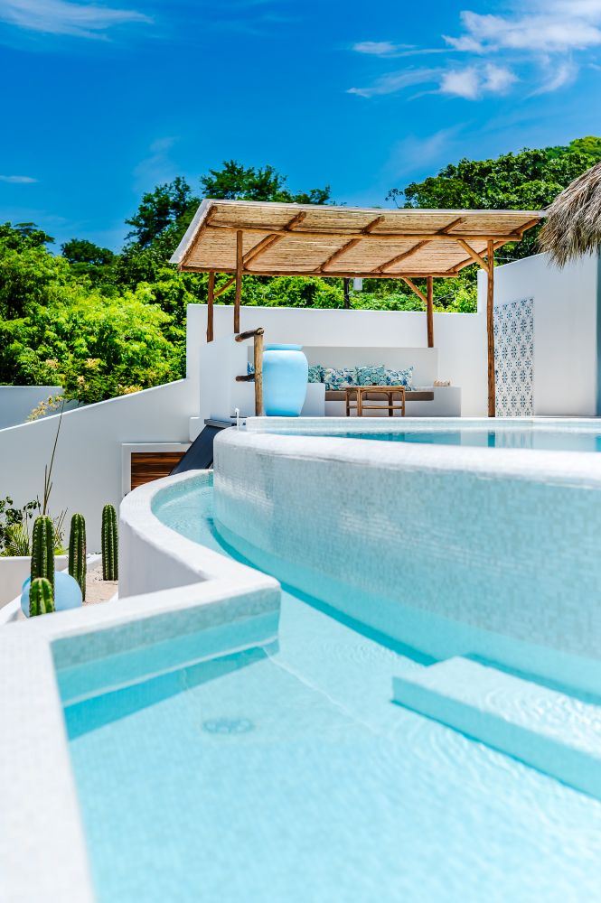 Outdoor pool photography Costa Rica – private terrace with plunge pool and sunny sky