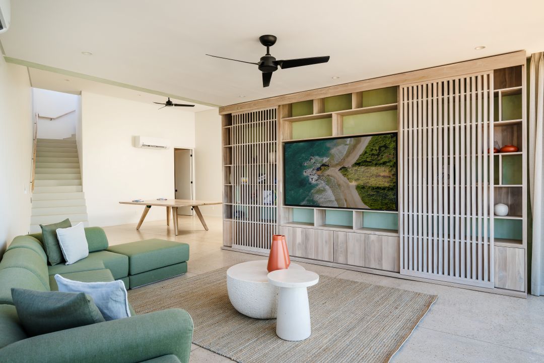 Balcony lifestyle photography Costa Rica – modern vacation home terrace with lounge chairs and natural decor