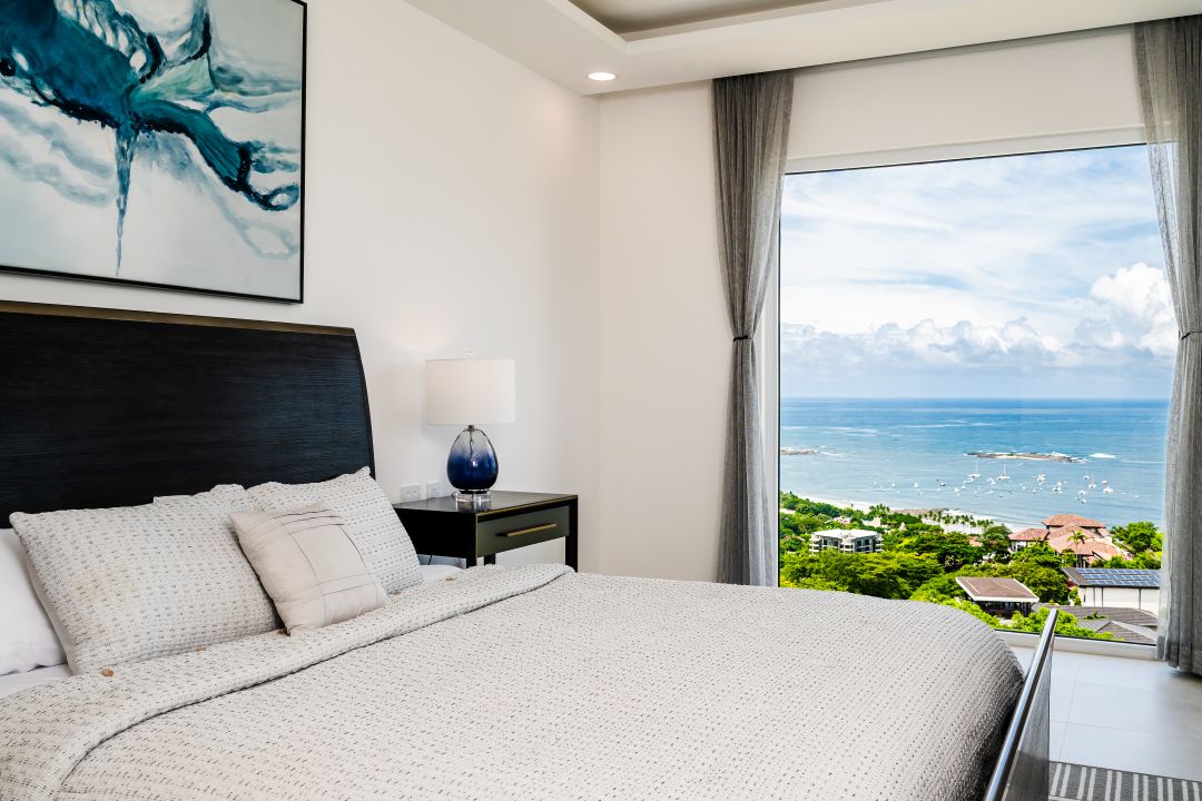 Bedroom photography Costa Rica – modern bedroom with sea view and soft daylight