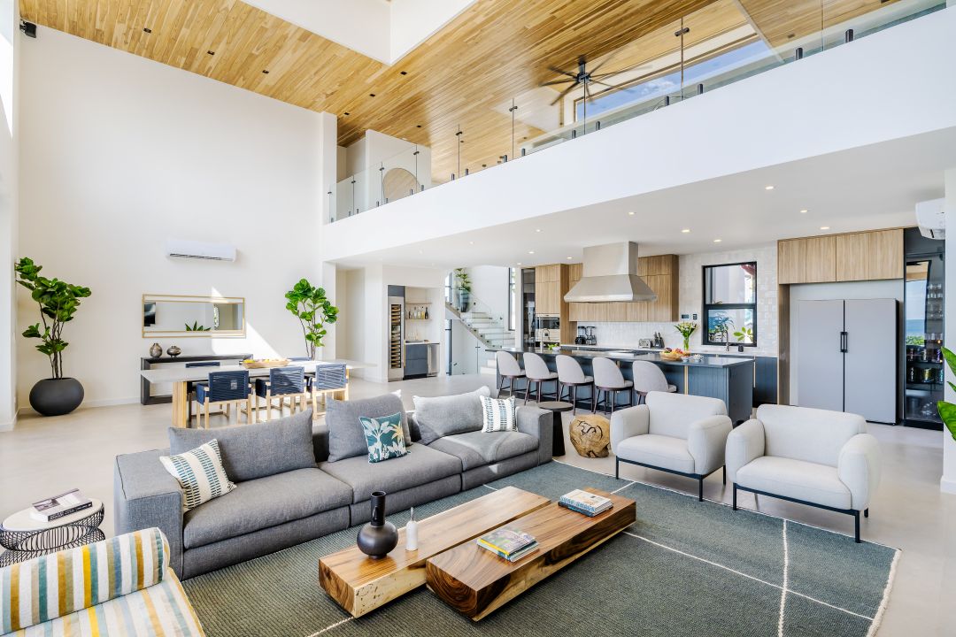 Interior photography Costa Rica – elegant vacation rental living room with wooden ceiling and bright tones