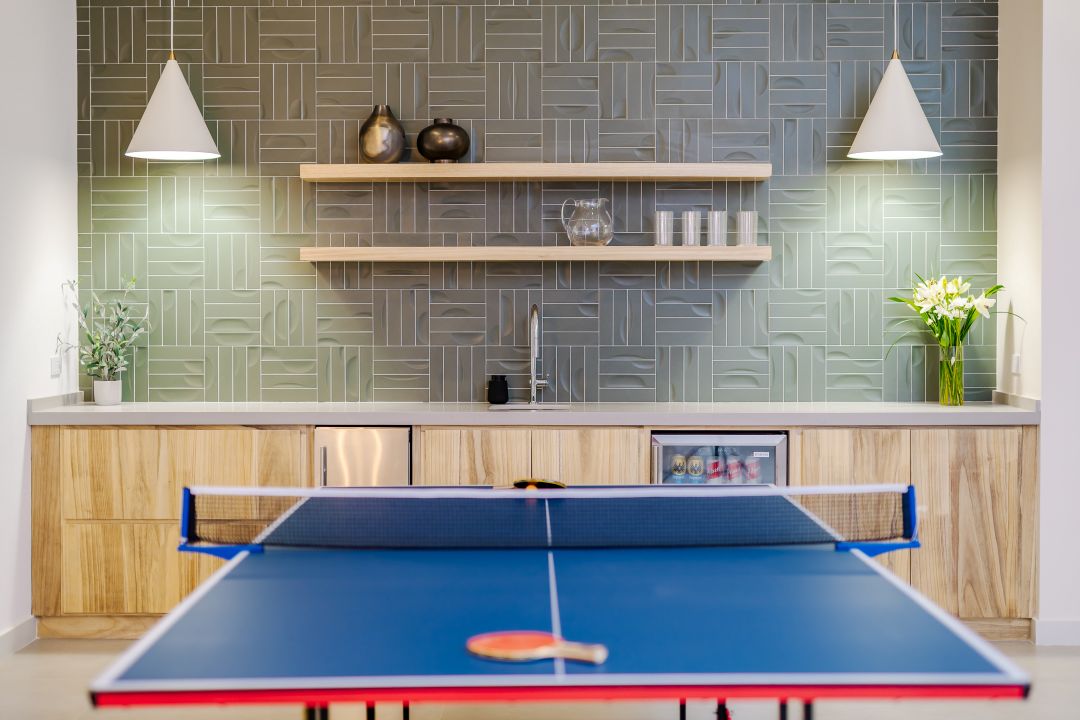 Entertainment room photography Costa Rica – modern ping-pong table in wooden decor setting